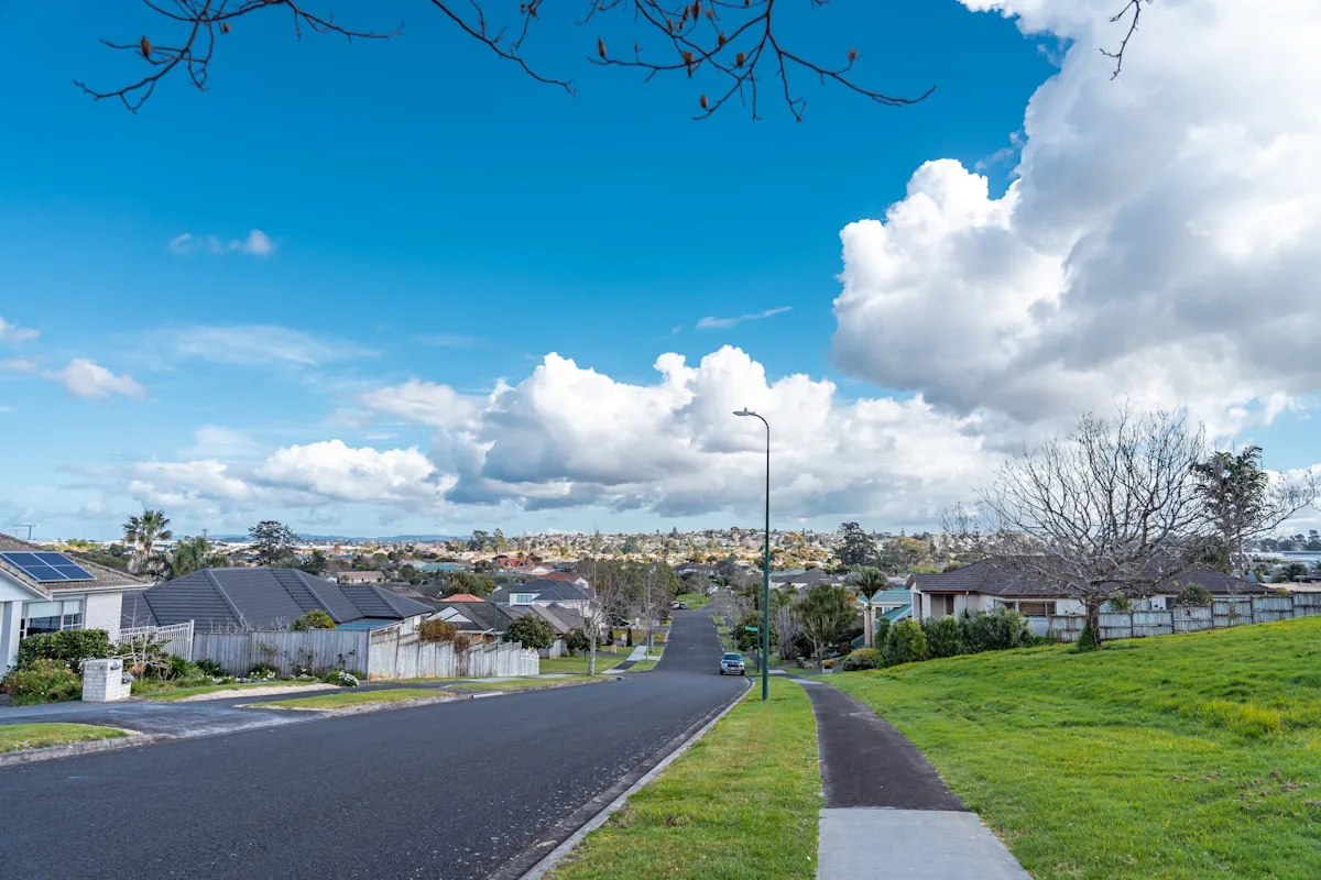 Street of Australian suburban houses, where the serviceability buffer quietly shapes every buyer's ceiling
