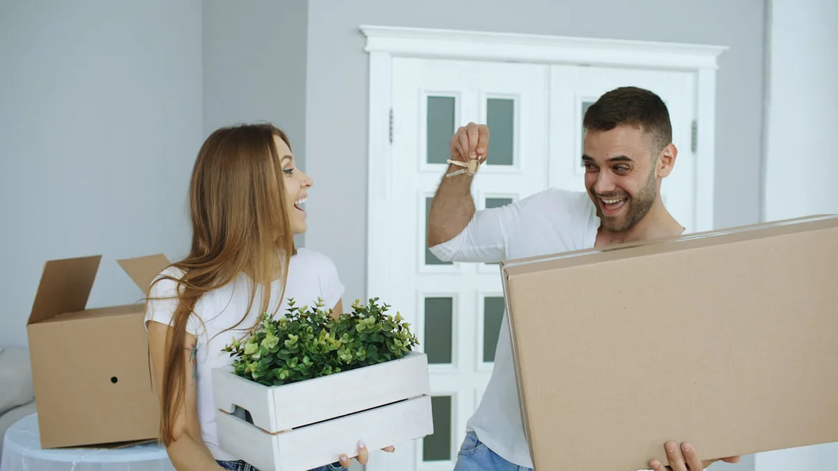 A couple with keys to their new home, the payoff for getting borrowing-ready before bidding
