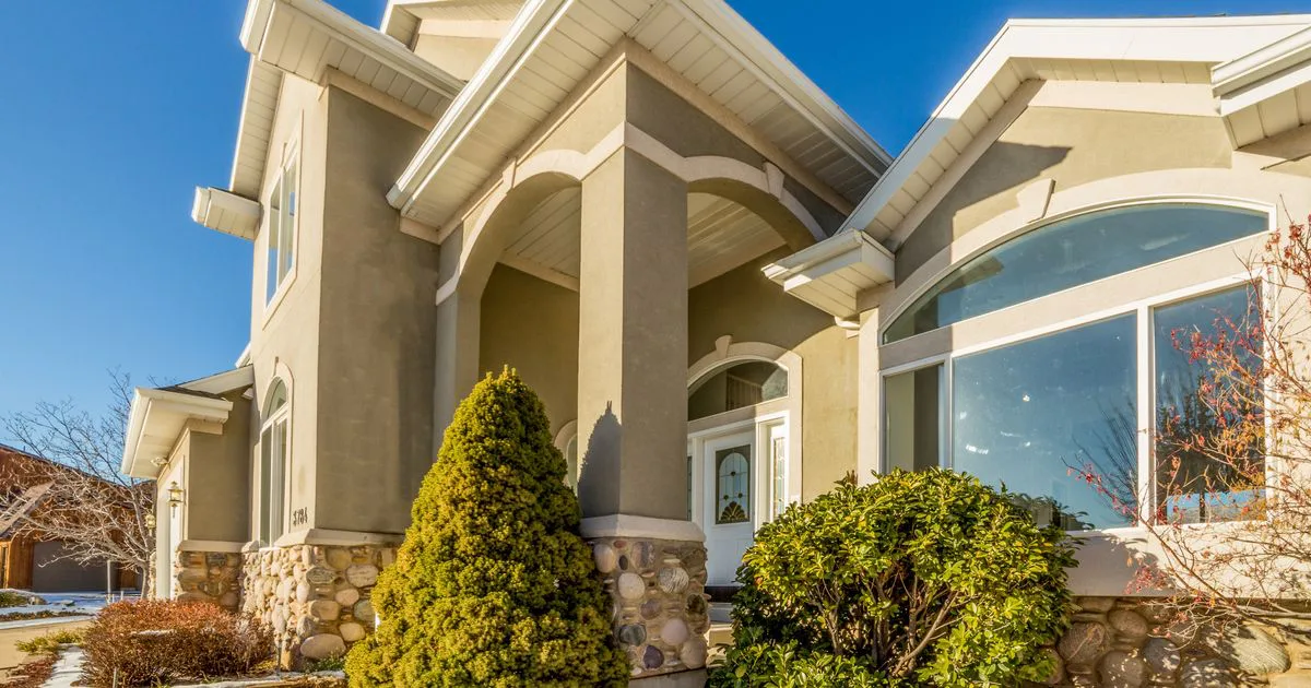 Suburban home catching sun across two sides on a diagonal block