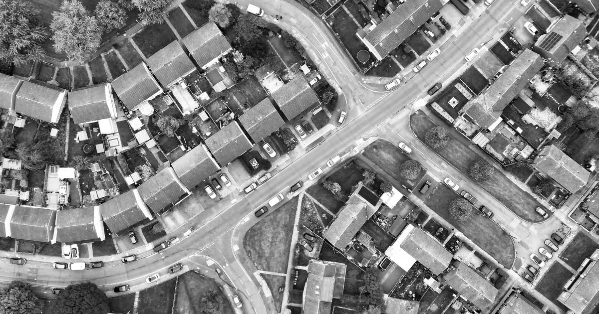Aerial view of suburban rooftops and streets